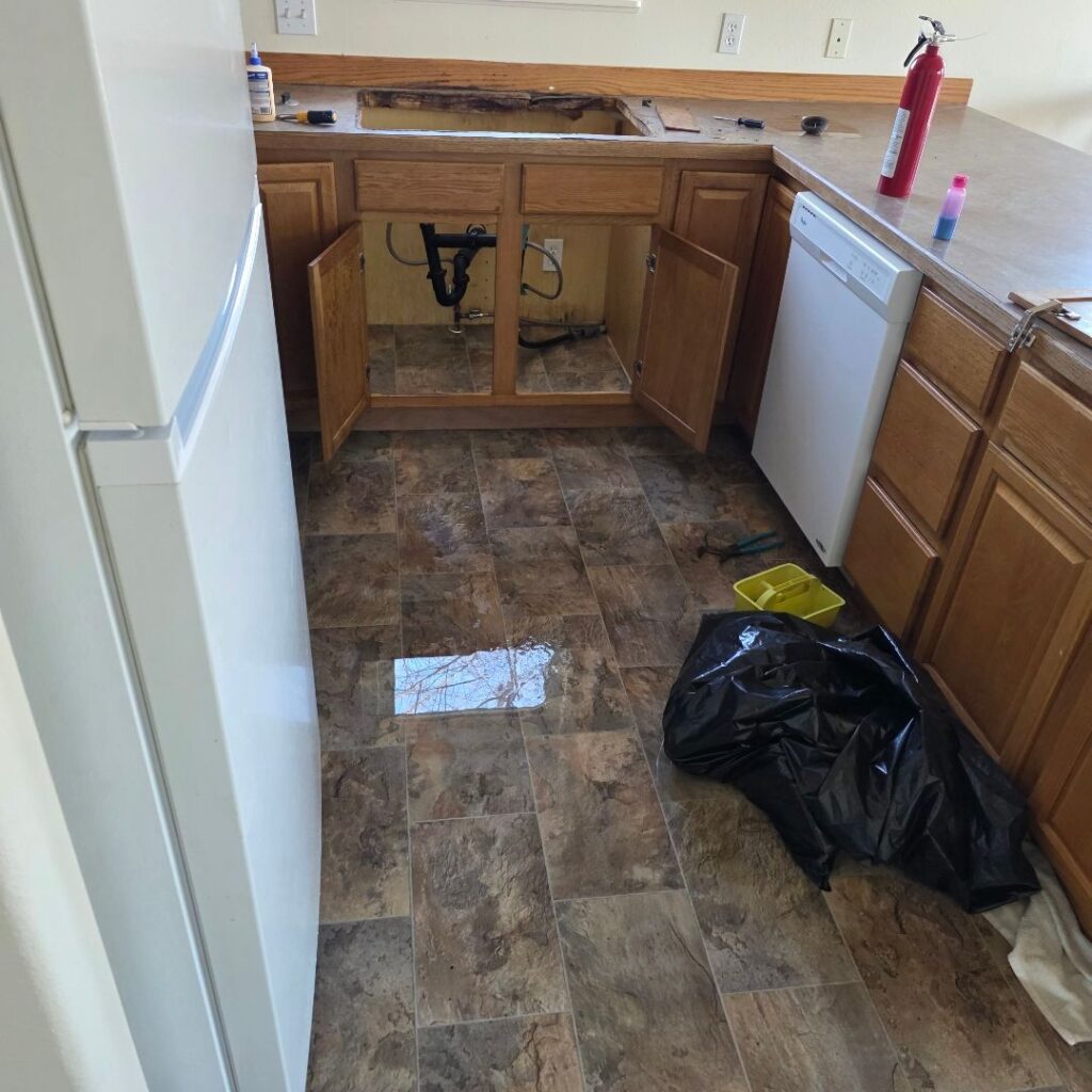 Water damage in a garage documented during an insurance claim